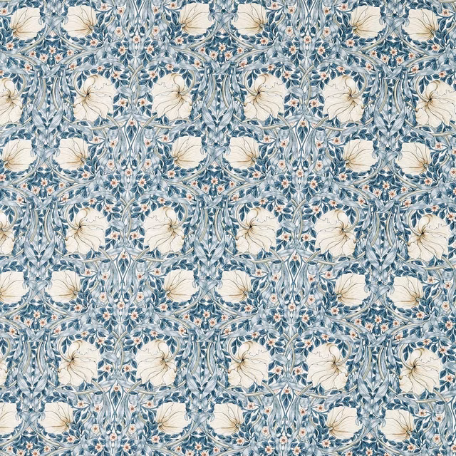 Light blue floral fabric with cream flowers, curling foliage and coral buds