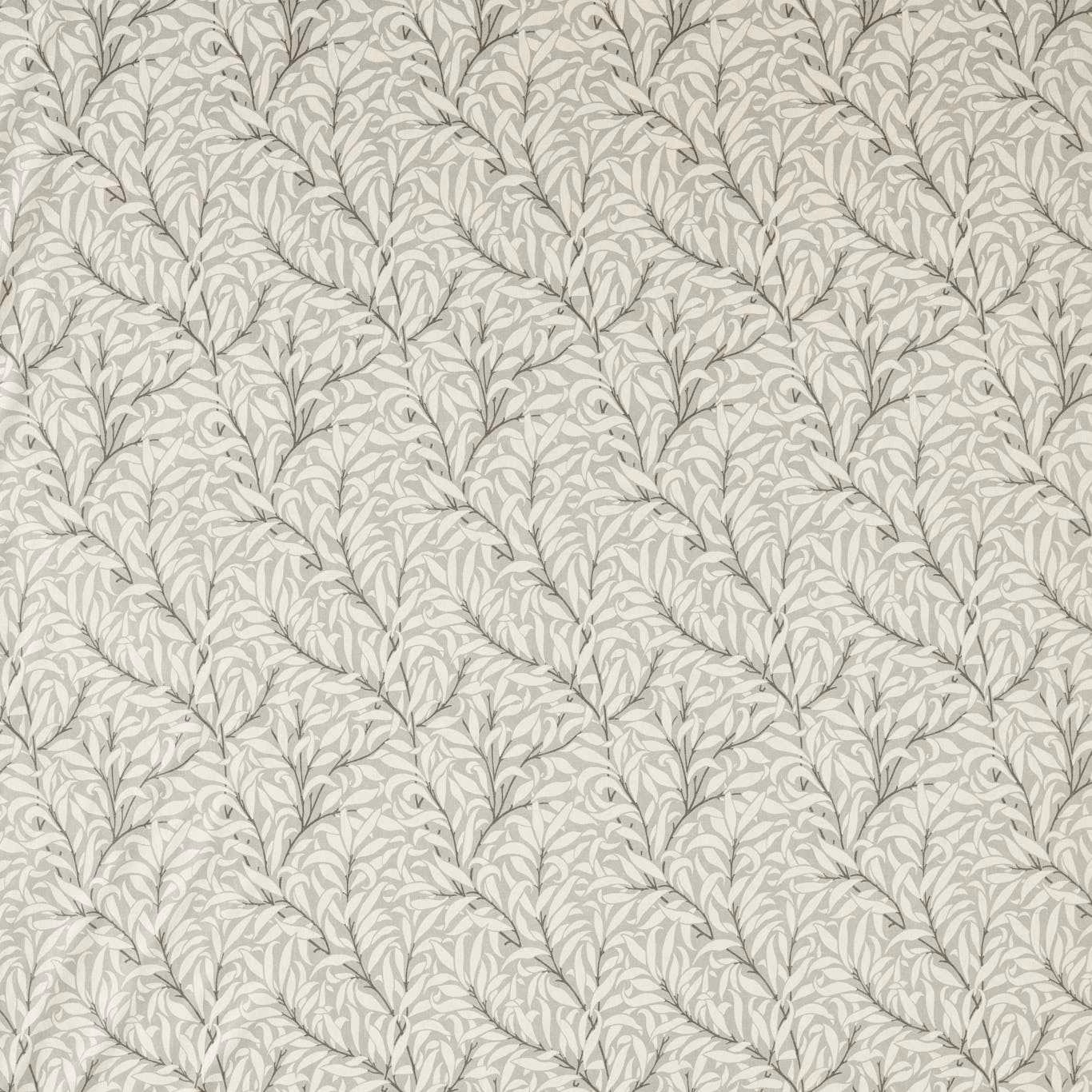 Close view of pale grey willow boughs on a finely textured light ground