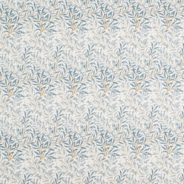 Mineral blue willow branches with tan stems across a pale botanical textile ground