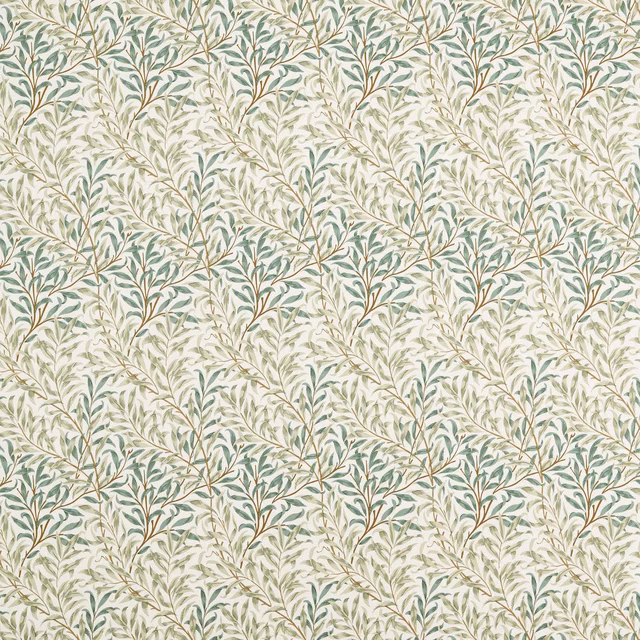Soft teal and mint leafy branches on a pale cream botanical fabric ground