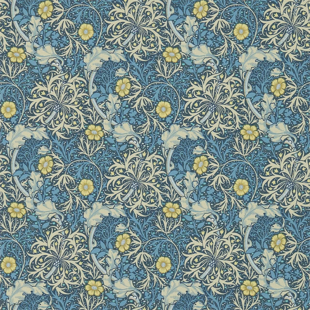 Blue-green botanical wallpaper with pale birds, cream foliage and mustard flowers