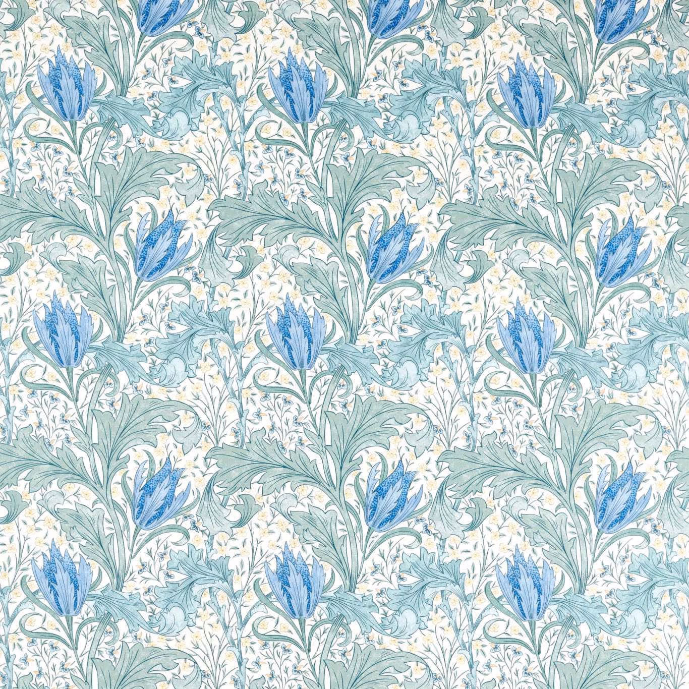 Cornflower-blue flower heads and pale aqua leaves on an ivory botanical fabric