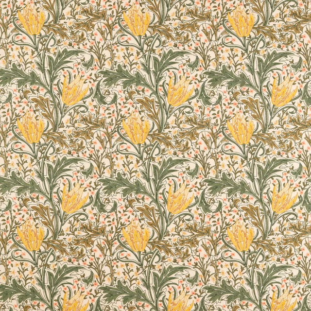 Dense artichoke-green and weld-yellow floral embroidery over a warm ivory ground