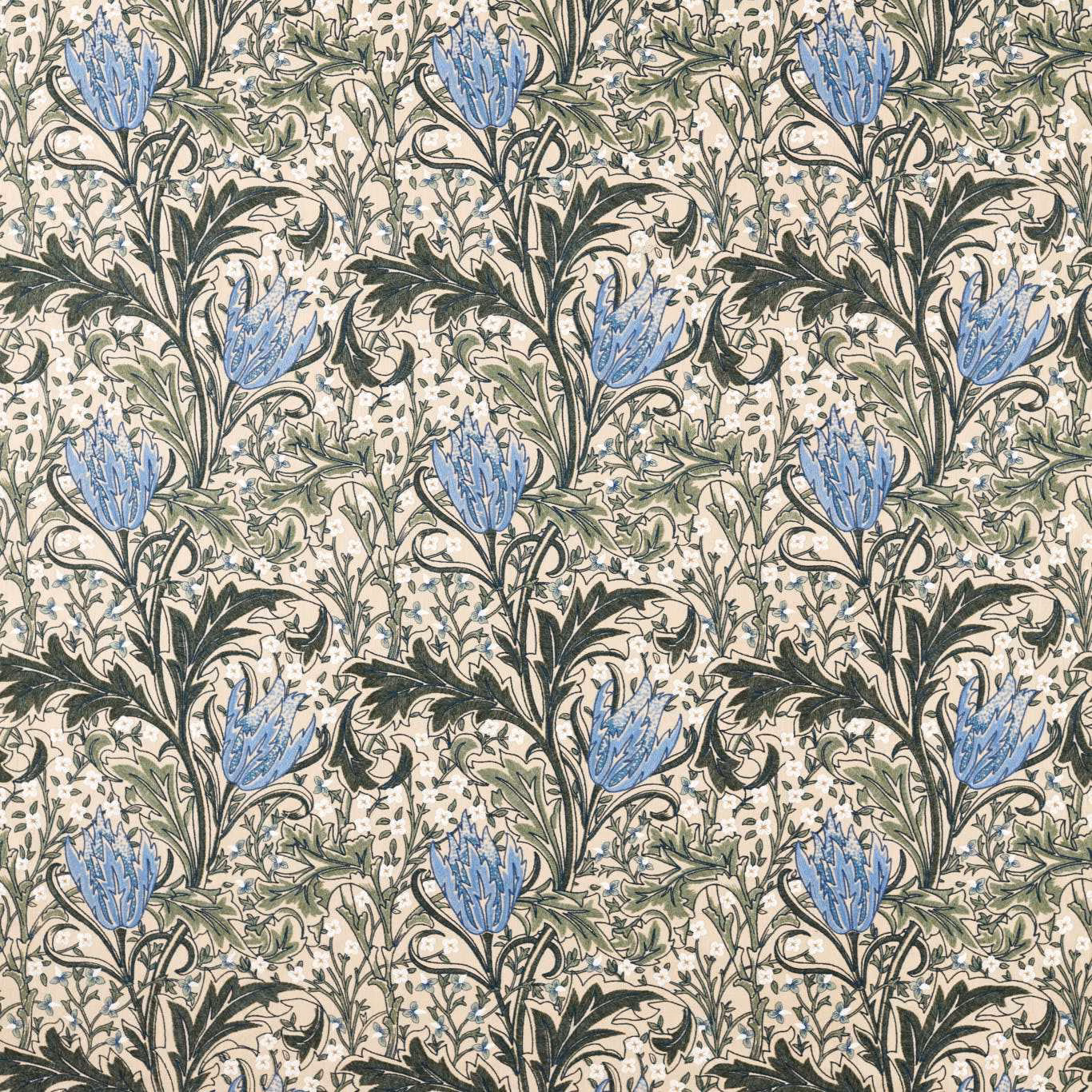 Cream-ground floral fabric with forest foliage and cornflower-blue lily heads