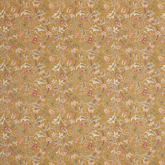 Ochre-gold fabric with dense scrolling tulips, cream leaves and coral paisley details