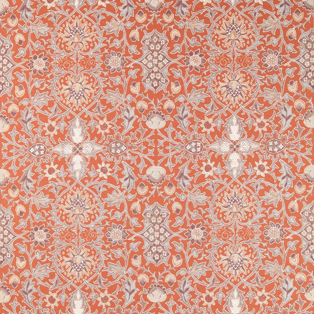 Russet terracotta woven fabric with cream and blue-grey scrolling floral motifs
