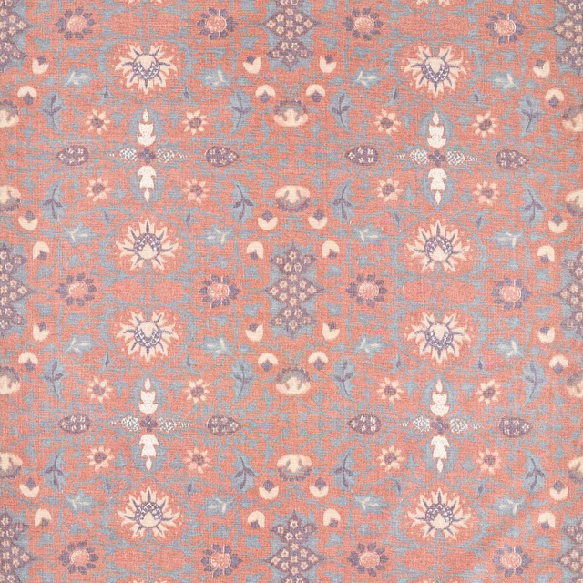 Madder coral floral fabric with blue-grey foliage, cream flowers and plum motifs