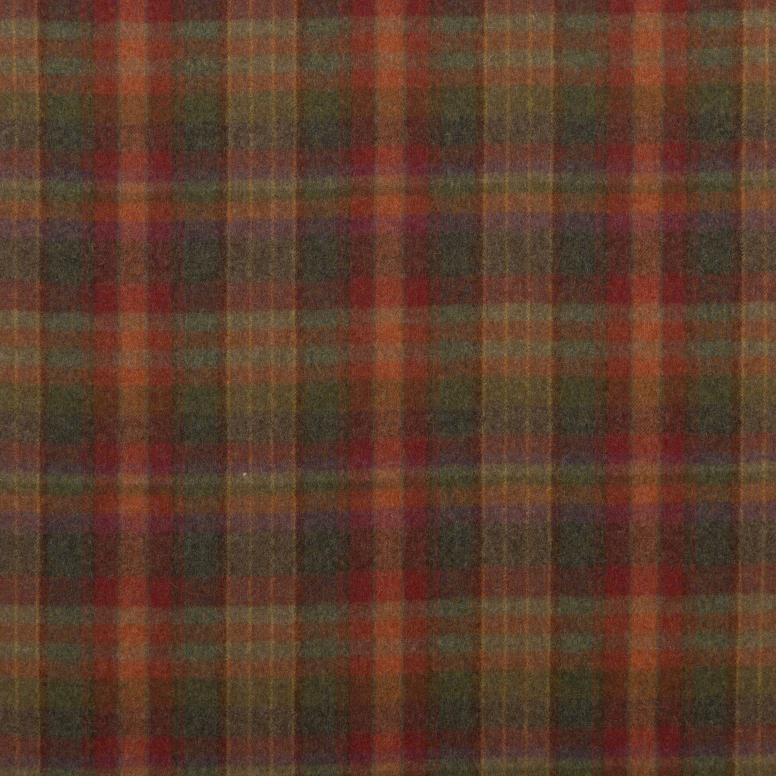 Muted red, lovat green and heather plaid with a softly textured wool surface