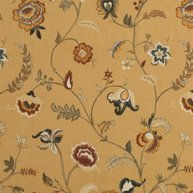 Warm ochre floral fabric with rust, cream and olive trailing botanical motifs