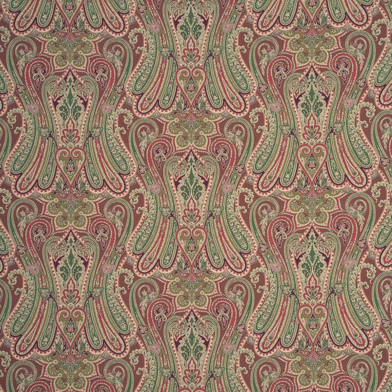 Muted damson paisley with olive, sage and cream scrolling motifs on textured cotton