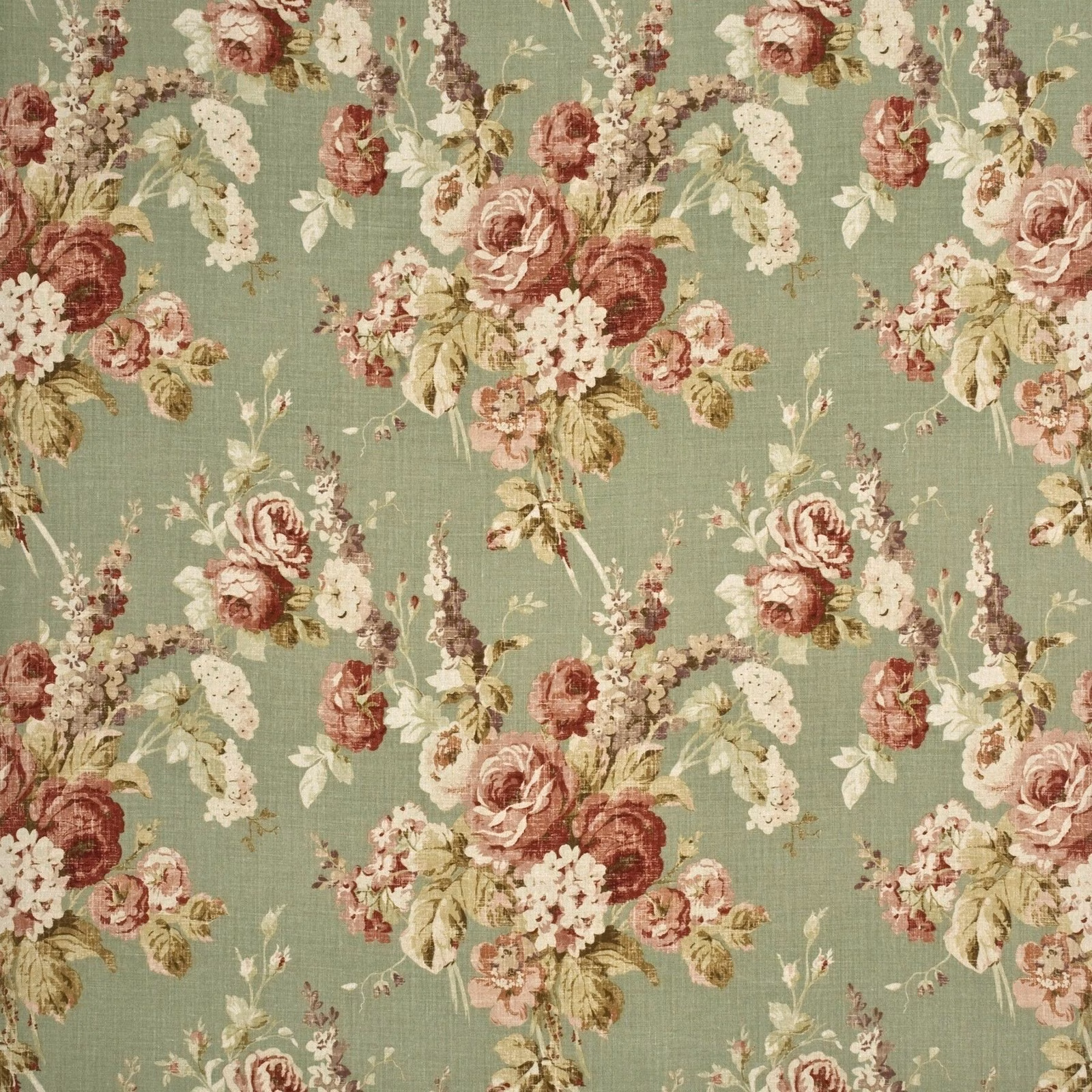 Muted sage linen with coral rose bouquets, cream flowers and olive leaves