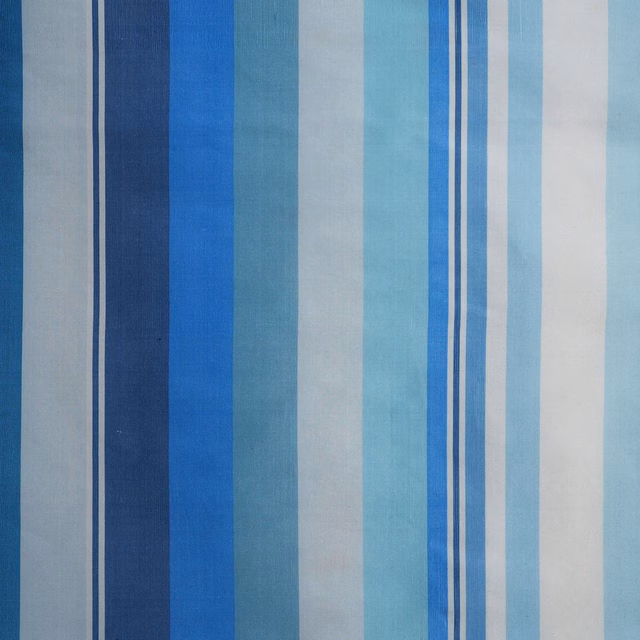Fine silk fabric with vertical navy, cobalt, teal and pale aqua stripes