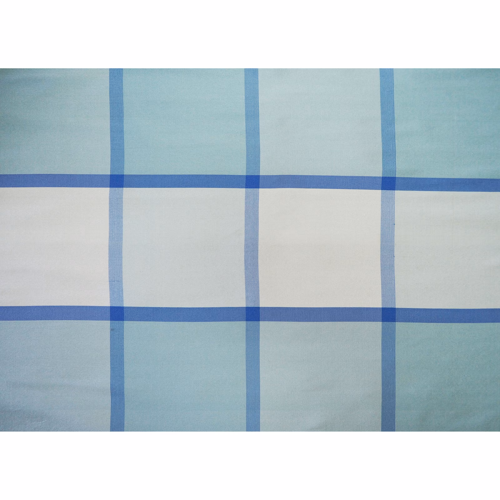 Pale aqua silk with translucent royal-blue windowpane check and subtle sheen