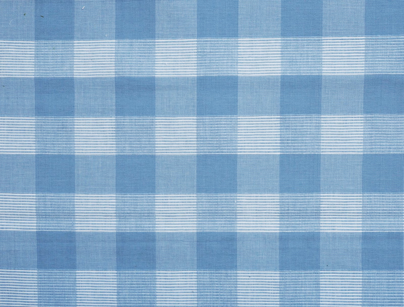 Cool dusty blue cotton check with pale woven lines and textured surface