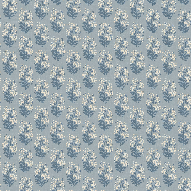 Muted denim-blue wallpaper with repeating cream flower sprigs and slate-blue foliage
