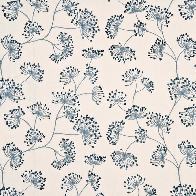 Soft blue-grey branching seedhead motifs scattered across a warm cream linen-textured ground