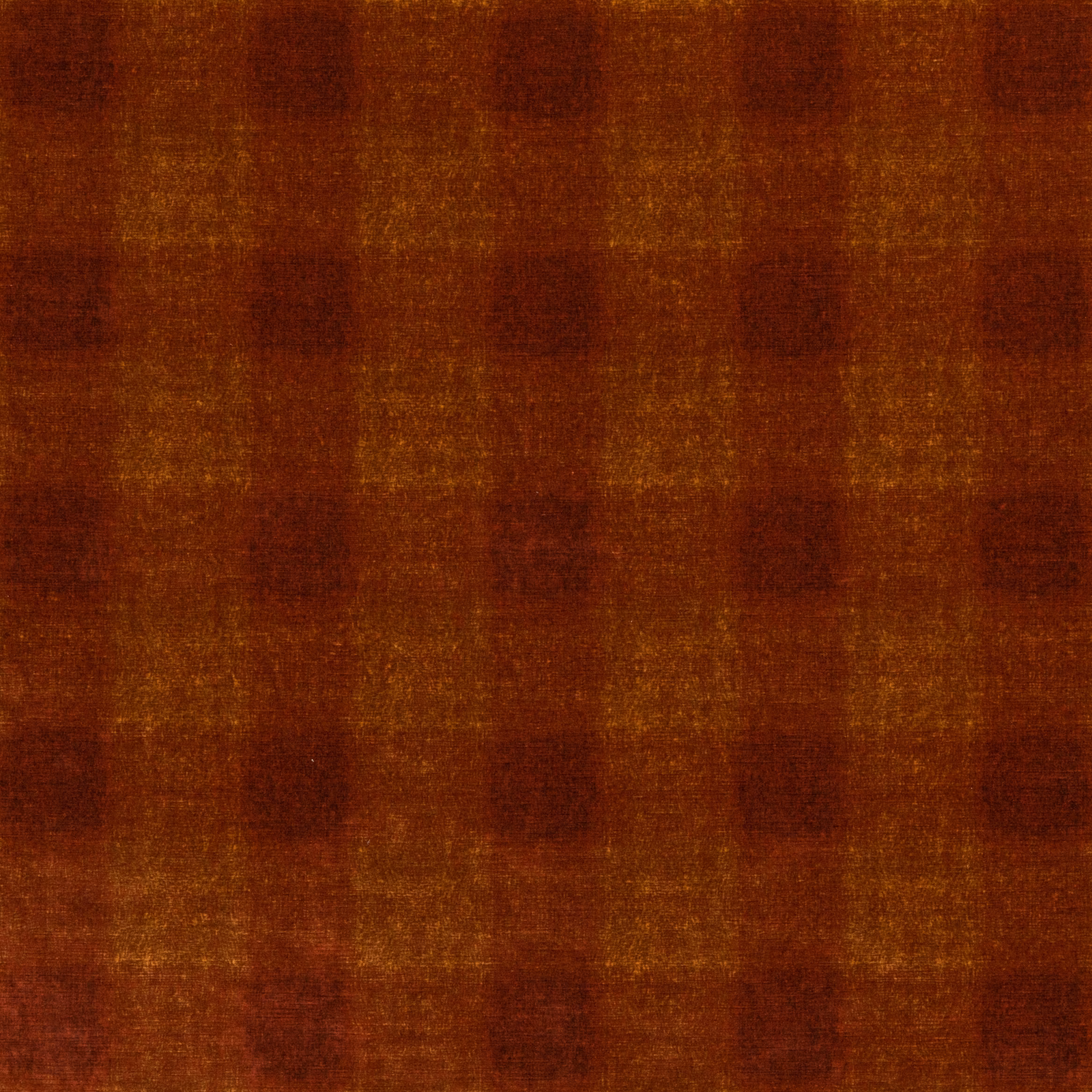 Rust-brown velvet with softly blurred tonal windowpane check and warm amber highlights
