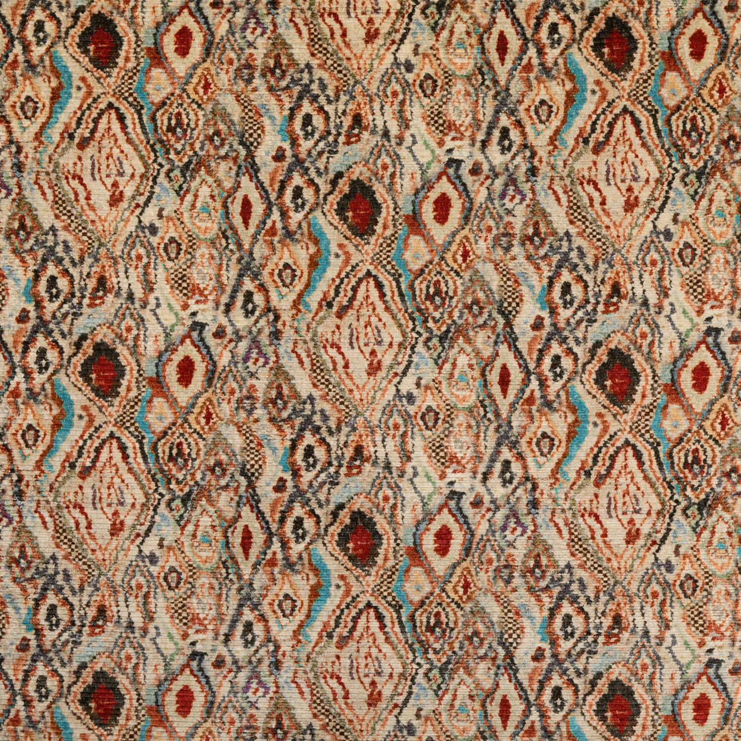Teal and spice diamond motifs across an ivory, softly textured velvet ground
