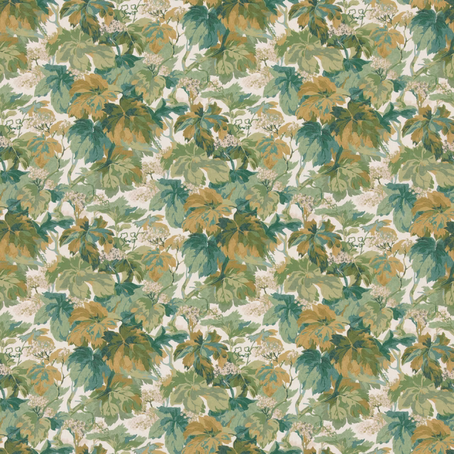 Emerald and sage leafy botanical fabric with ochre foliage on a cream ground