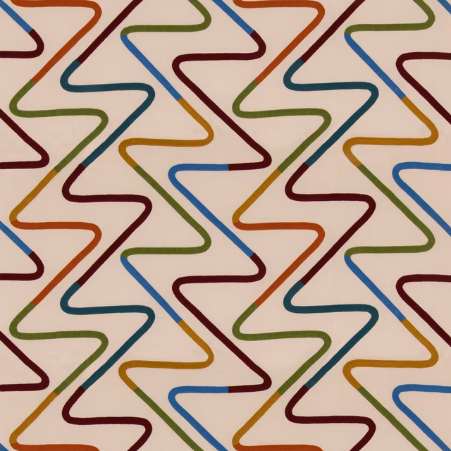 Cream fabric with repeating angular lines in rust, teal, blue, green and ochre