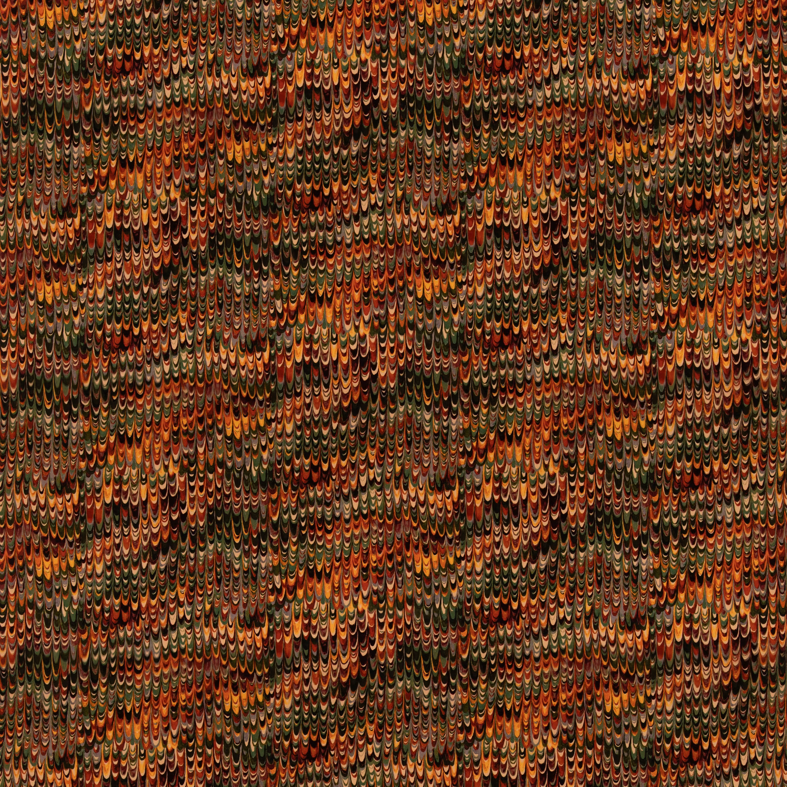 Dense red and green velvet with tiny scalloped teardrop motifs and warm rust highlights
