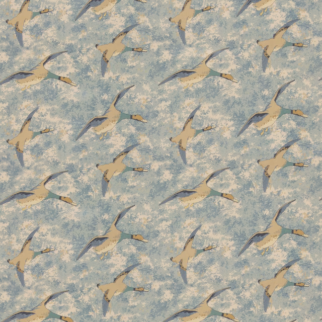 Muted duck-egg blue fabric with flying ducks and softly mottled pale ground