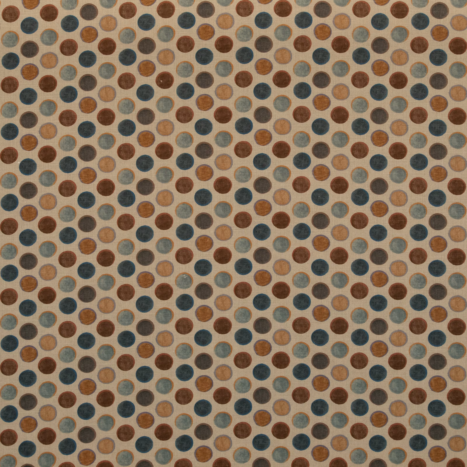 Antique beige woven fabric with repeated muted teal and russet round spots