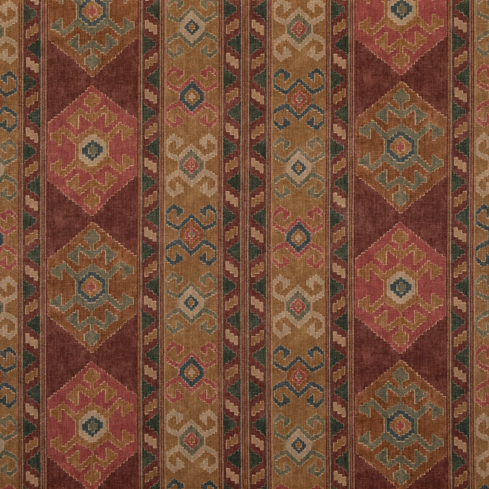 Muted plum woven textile with ochre, teal and terracotta geometric vertical bands