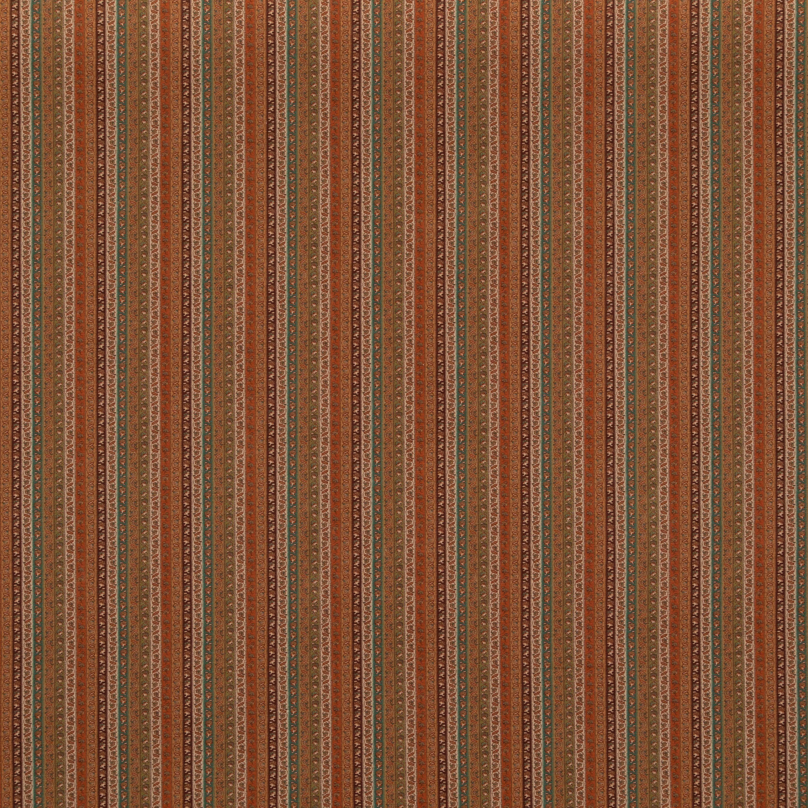 Close view of rust spice vertical stripes with sage and cream woven motifs