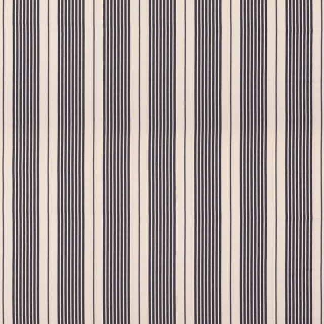 Ivory cotton fabric with varied vertical indigo pinstripes and grouped bands