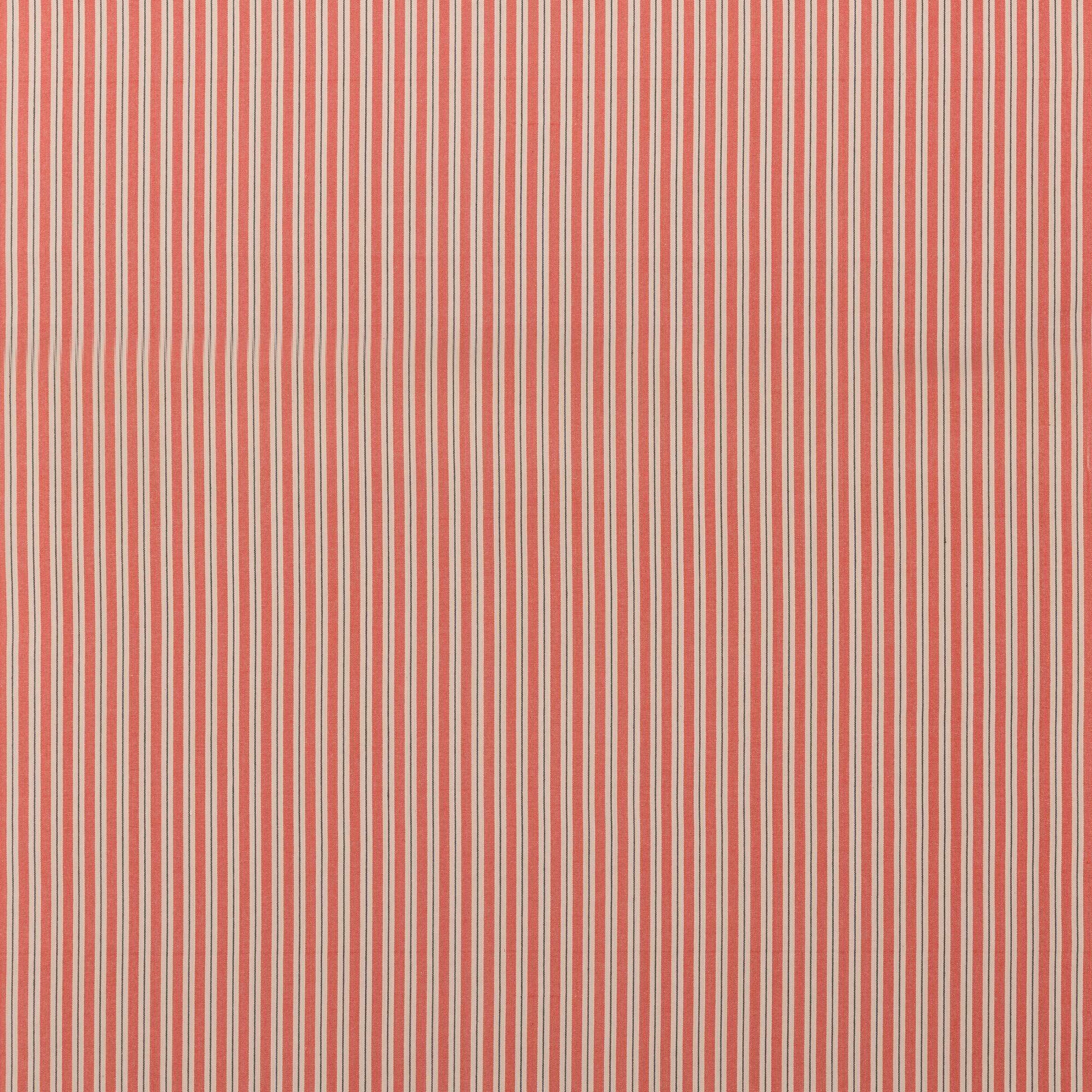 Warm brick-red cotton with fine cream vertical stripes and a tactile woven surface