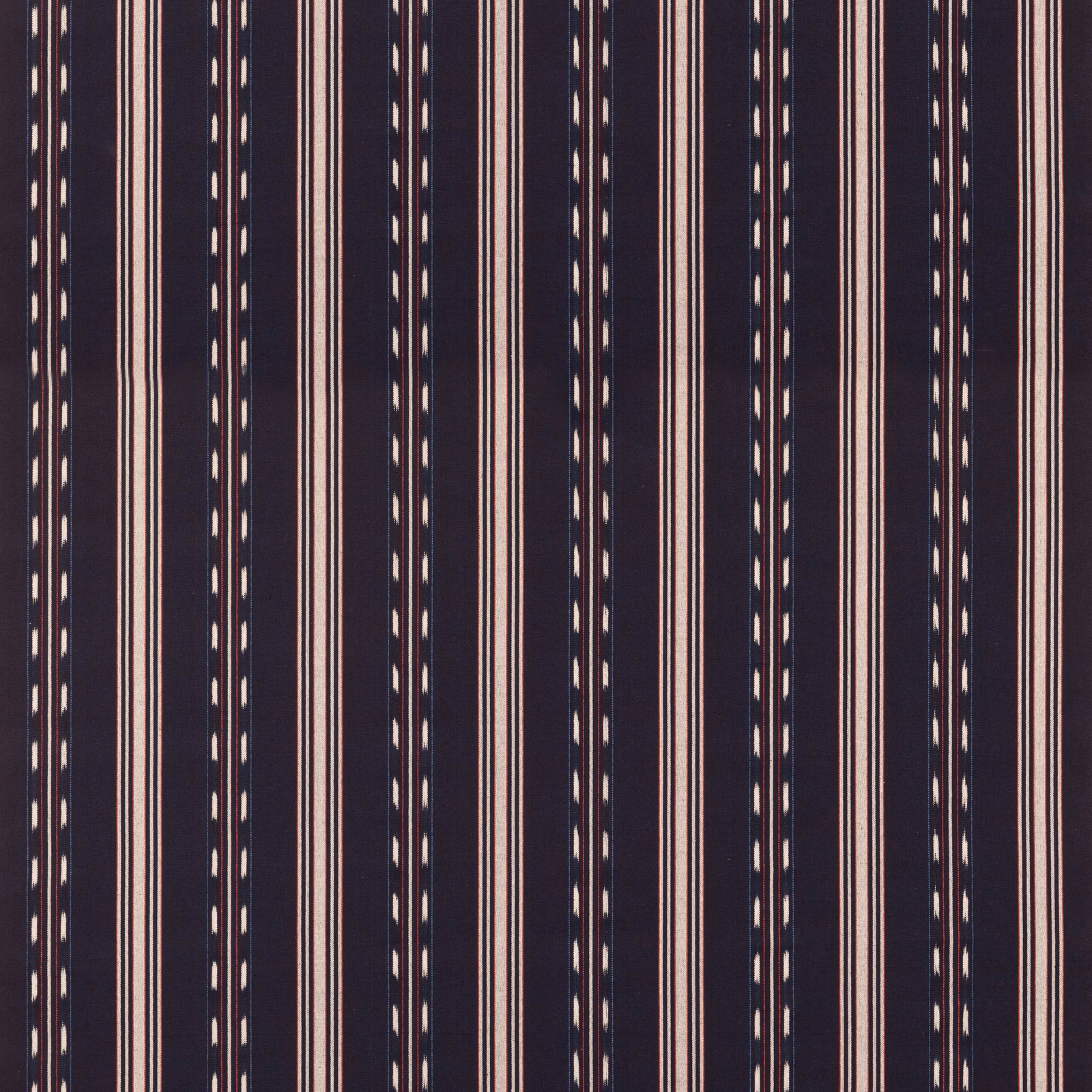 Dark indigo cotton stripe with cream pin lines, red accents and dotted vertical details