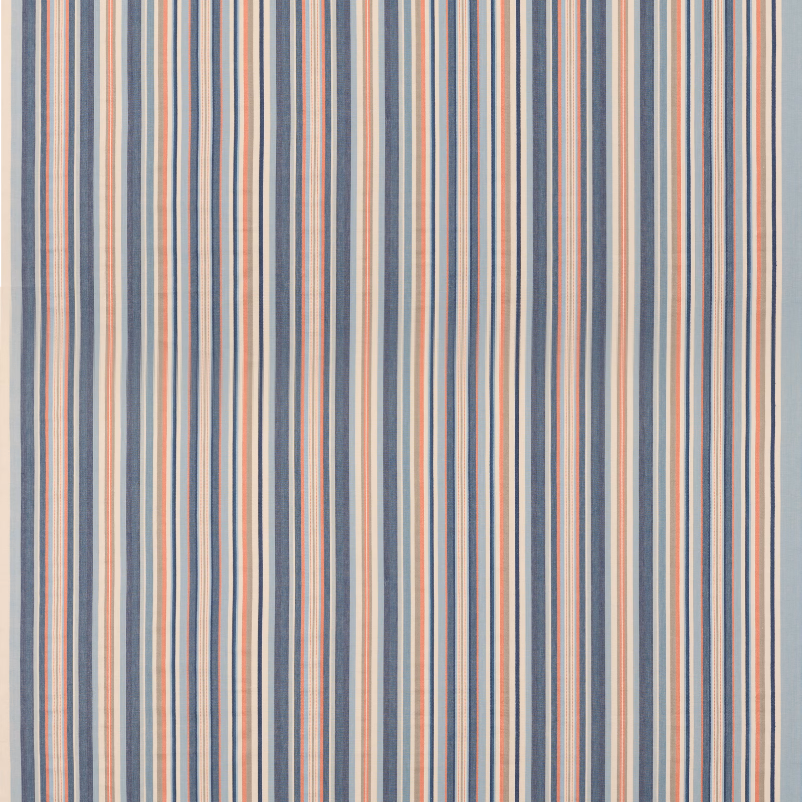 Close view of fine vertical blue and rust stripes on a cream cotton ground