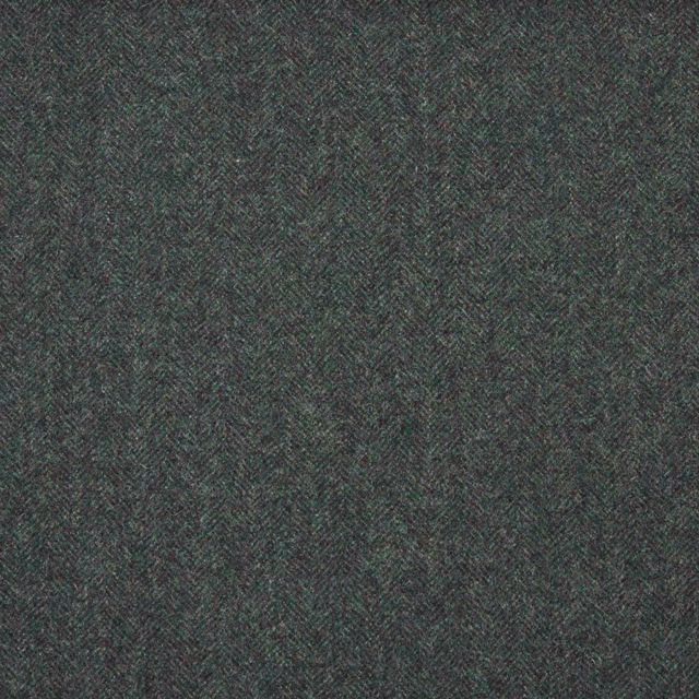 Close view of charcoal green-grey fabric with a fine woven herringbone texture