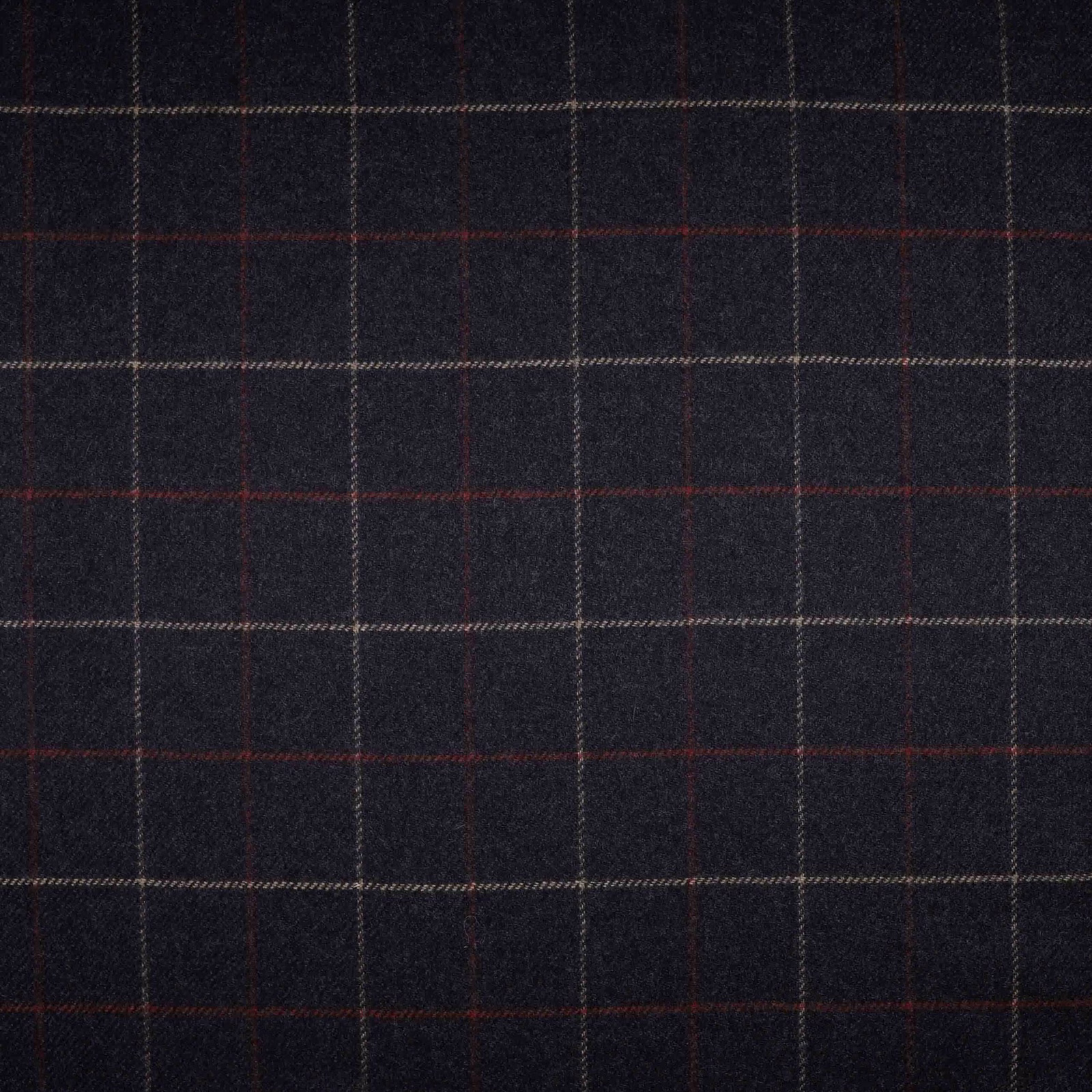 Charcoal-black checked textile with fine muted red, blue and pale taupe windowpane lines