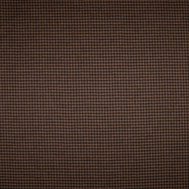 Dark mocha woven fabric with a fine warm-brown houndstooth pattern and compact textured surface