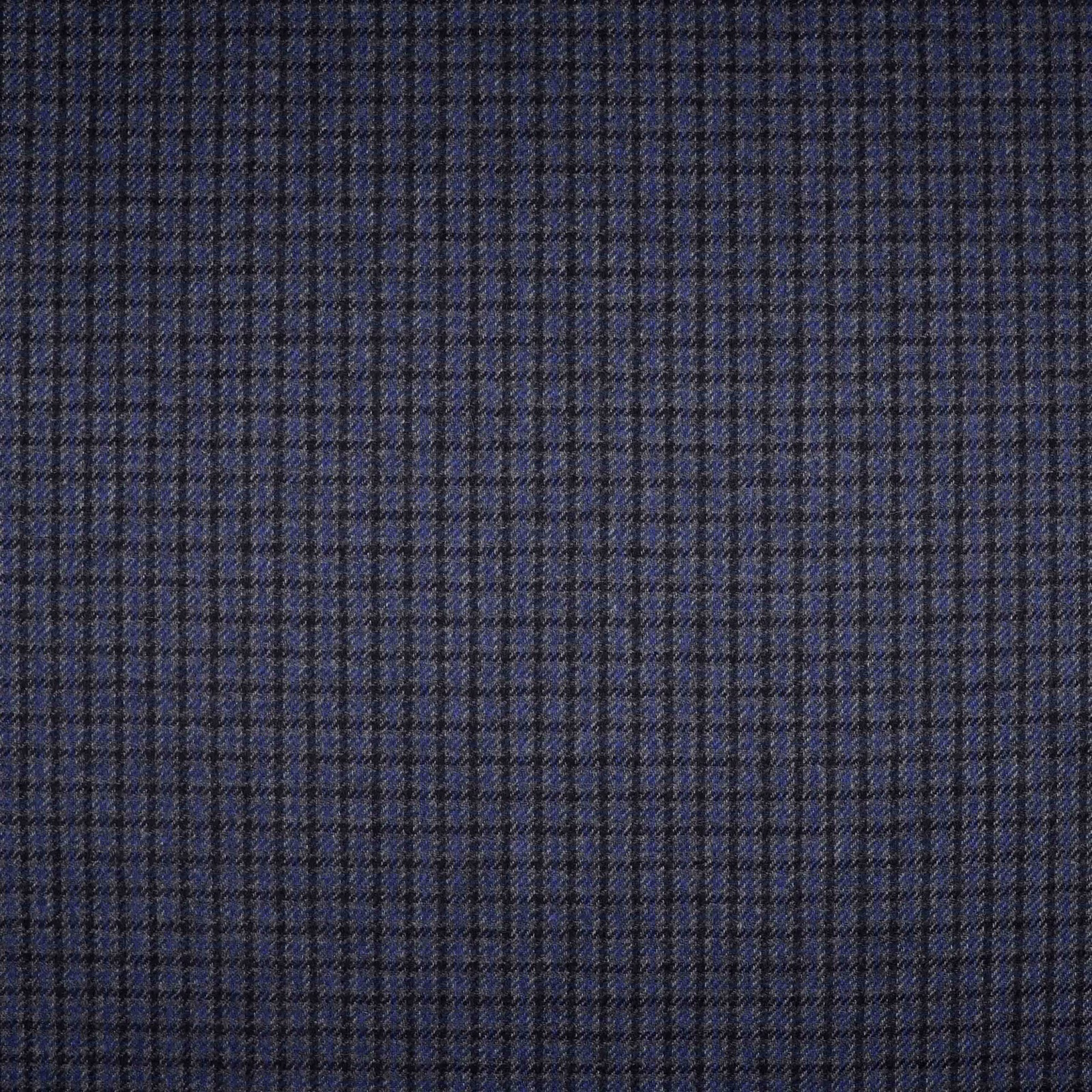 Deep navy woven fabric with a fine charcoal checked grid and tactile texture