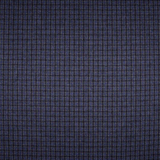 Deep navy woven fabric with a fine charcoal checked grid and tactile texture