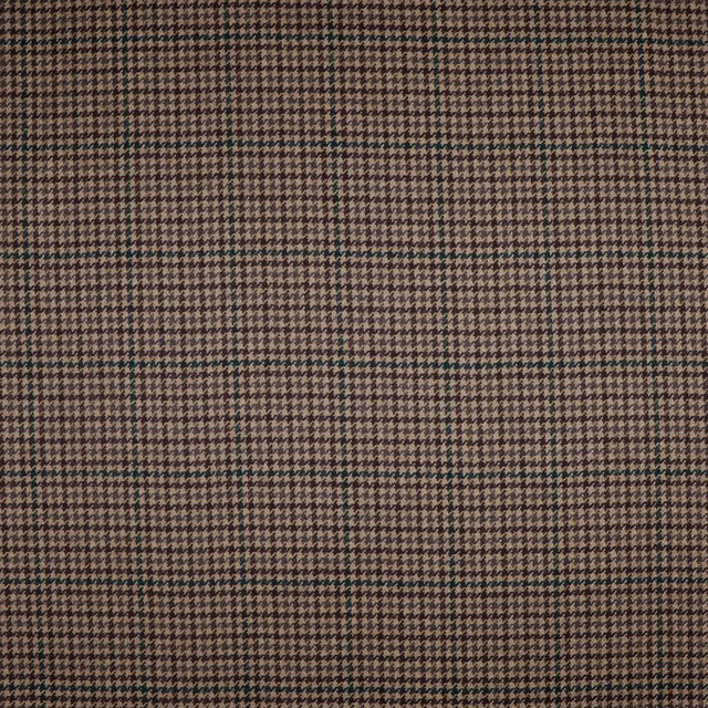 Close-up of brown and charcoal small houndstooth woven fabric with subtle tonal variation
