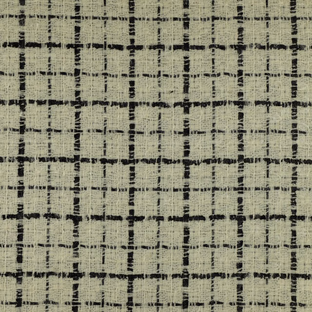 Pale sage woven fabric with irregular charcoal checks and nubby texture