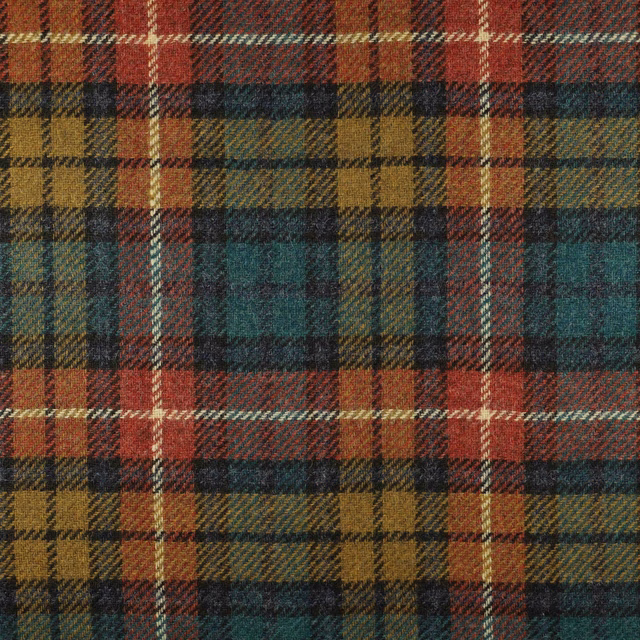Muted rust, teal, ochre and charcoal woven plaid with diagonal texture