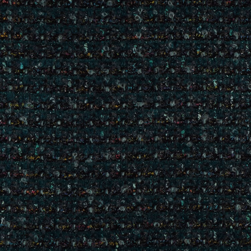 Close-up of dense dark teal woven fabric with horizontal nubs and multicoloured flecks