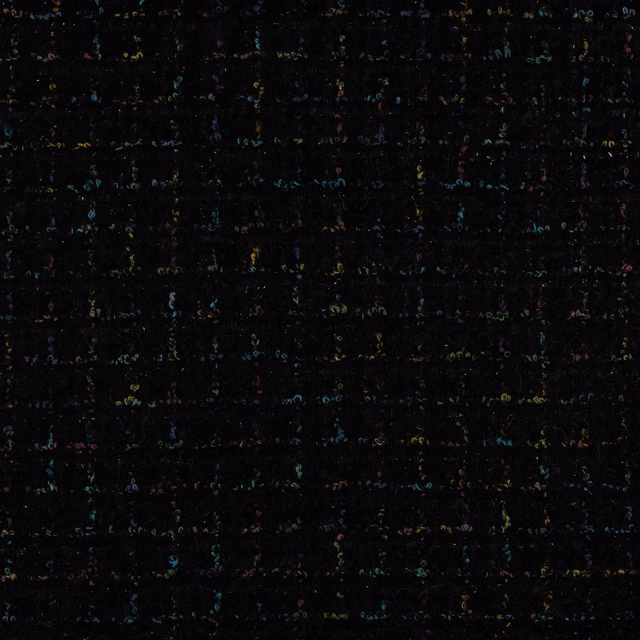 Near-black woven swatch with tiny blue, green, pink and ochre flecks