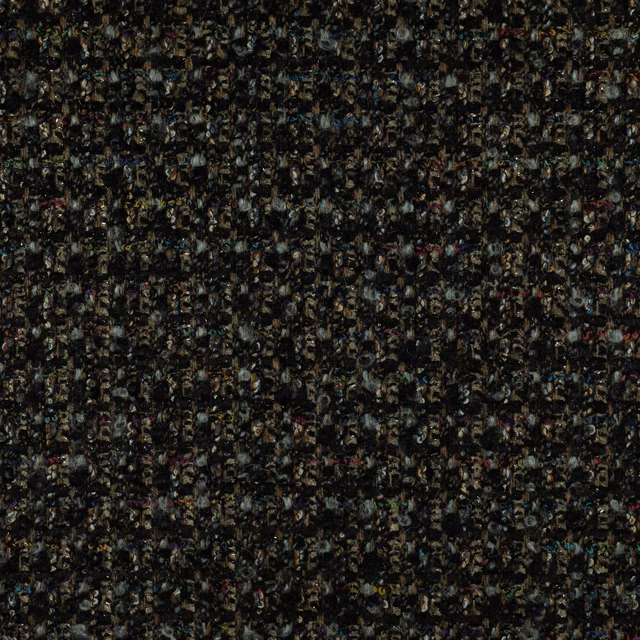 Dense charcoal textile with tiny teal, olive, cream and rust-coloured flecks