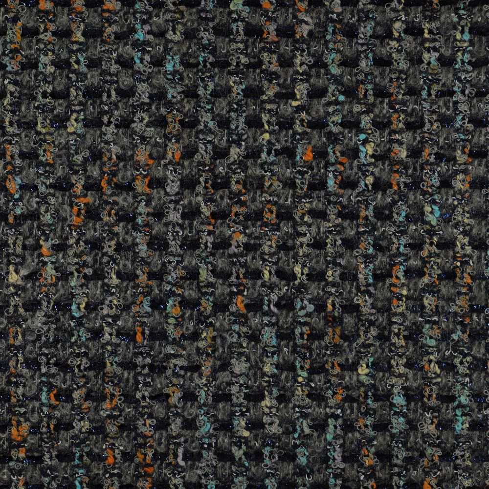 Charcoal woven upholstery with tiny looping marks and muted teal and rust flecks