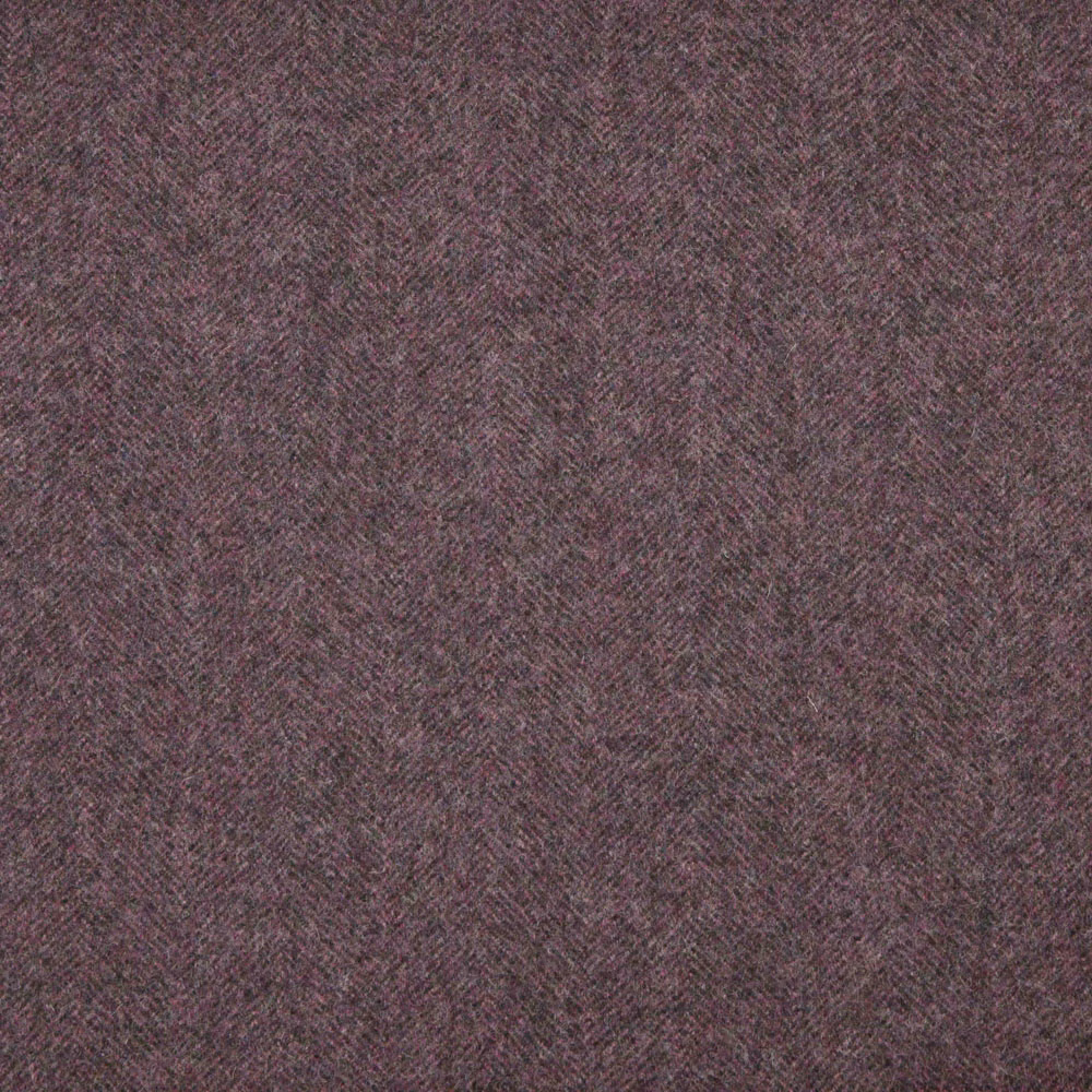 Close view of muted brown-mauve taupe fabric with a fine herringbone weave