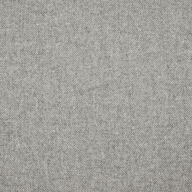 Soft grey woven fabric with a fine, tonal herringbone texture