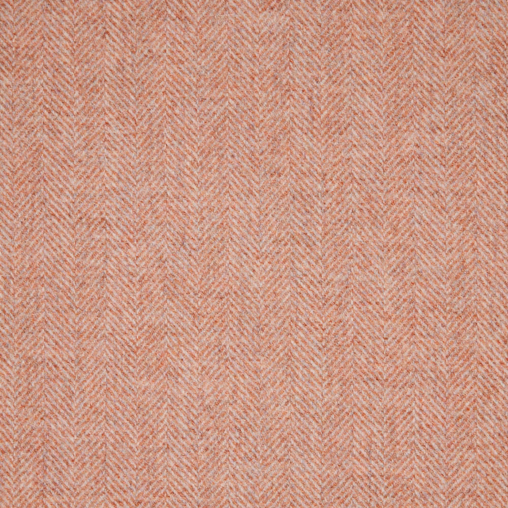 Dusty blush-pink woven fabric with a fine cream herringbone texture