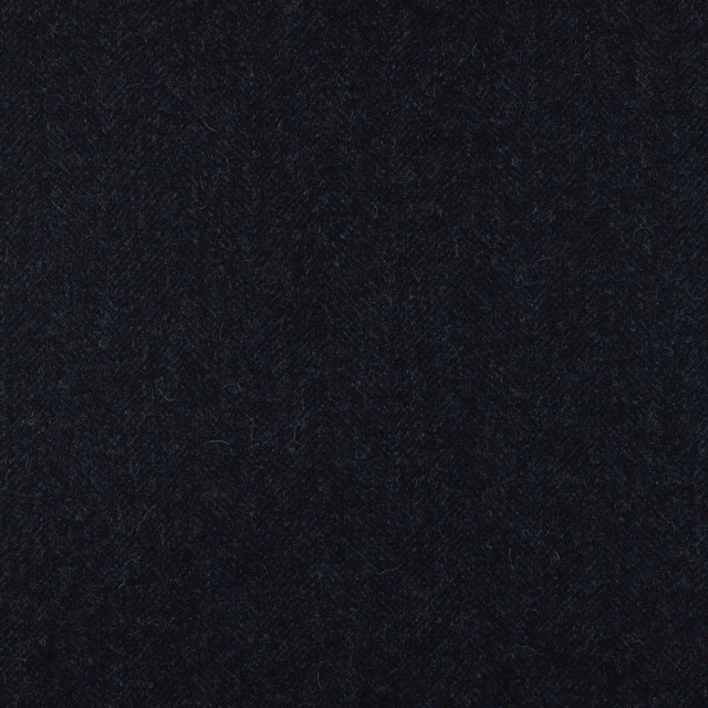 Near-black charcoal textile with subtle blue-grey flecks and fine vertical texture