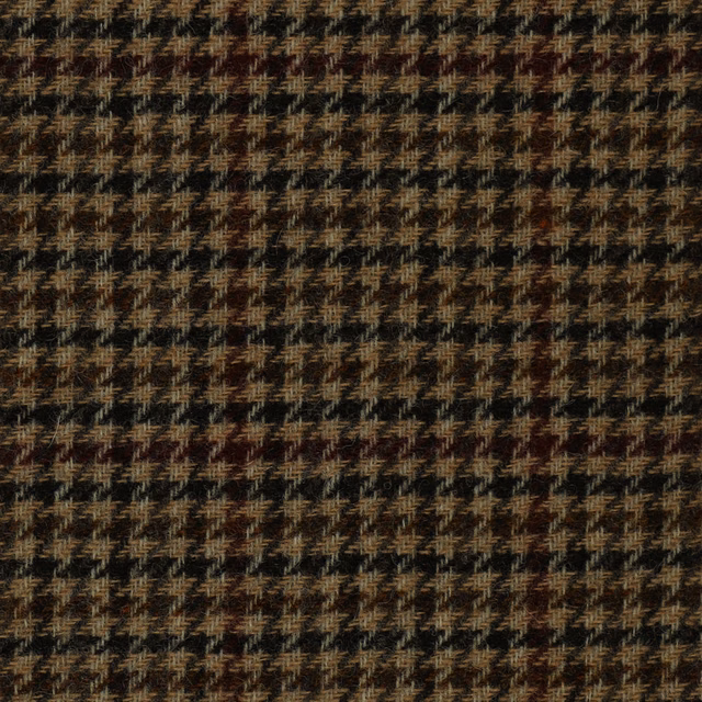Dark brown woven upholstery fabric with small camel broken checks and russet flecks